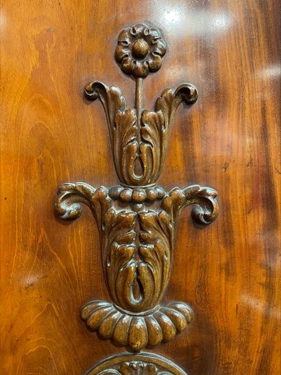 null Mahogany and mahogany veneer cabinet, molded and carved with foliage motifs
Sweden,...