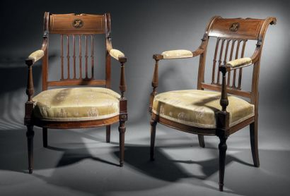 null Pair of mahogany and mahogany-stained wood armchairs. Tapered front legs with...