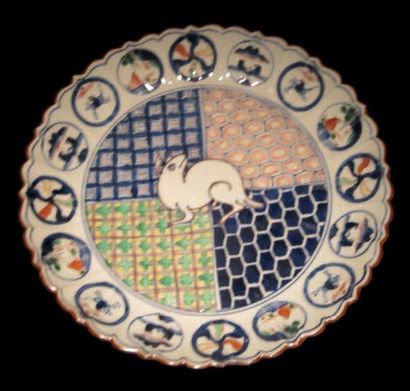 null QUATRE ASSIETTES POLYLOBÉES Japon, Arita (?), XVIIIe-XIXe siècle Porcelaine...