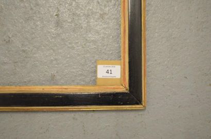 null Baguette plate en chêne mouluré noir et or. Époque Louis XVI (restaurations).
50,5...