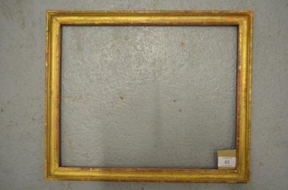 null Baguette en bois mouluré et doré. Époque Louis XVI (restaurations).
30,4 x 37,5...