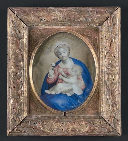 École FRANÇAISE vers 1680 
La Vierge à l'Enfant
Gouache sur vélin ovale, dans son...