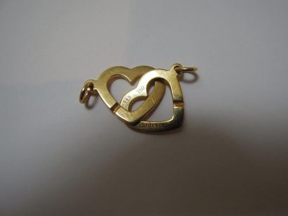 DINH VAN Partie de bracelet en or jaune 18 K formant coeur
Poids 2.60g
