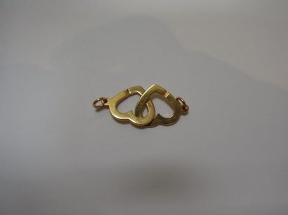 DINH VAN Partie de bracelet en or jaune 18 K formant coeur
Poids 2.60g