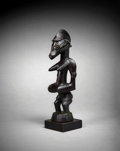  Statuette Sénoufo, Côte d'Ivoire Bois à patine noire suintante H. 20 cm Senufo figure,...