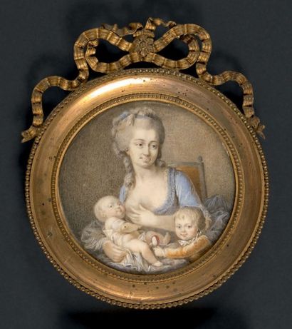 ECOLE FRANCAISE VERS 1775 Portrait d'une mère et ses deux enfants.
Miniature ronde.
D....