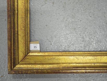 null Baguette en bois mouluré et doré.
Époque Louis XVI (modifiée dans ses dimensions)....