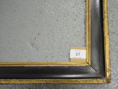 null Gorge en bois mouluré noir et or.
Fin du XVIIIème siècle (éclats). 53,3 x 66,8...