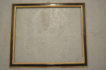 null Baguette plate en chêne mouluré noir et or.
Époque Louis XVI (restaurations)....