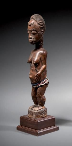 null Statuette Baoulé, Côte d'Ivoire
H. 44 cm - L. 9,5 cm
Cette délicate statuette...