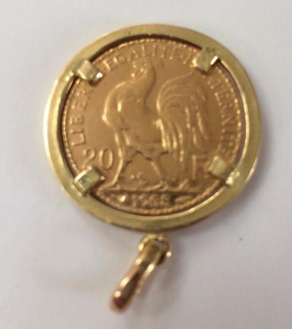 null Pièce de 20 francs or (au coq) datée 1908 montée et une chaîne en or (?)
Poids:...