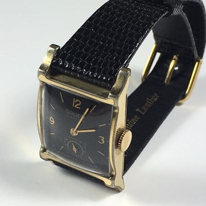 GRUEN GRUEN

"Verithin" No. C291182.

Montre bracelet en métal doré. Boîtier rectangulaire,...