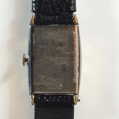 ELGIN ELGIN

Montre bracelet en acier et métal doré. Boîtier rectangulaire, anses...