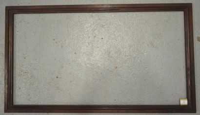 null CADRE en bois mouluré et teinté. XIXe siècle.
55,5 x 103,6 cm - Profil: 4,2...