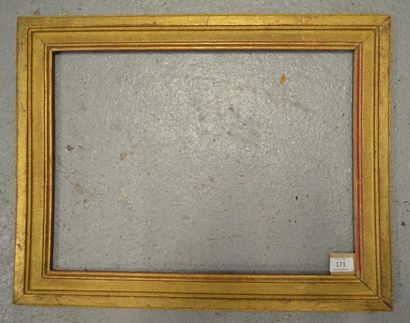 null BAGUETTE en bois mouluré et doré. Fin du XVIIIe siècle.
35,2 x 48 cm - Profil:...