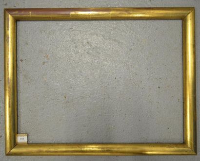 null JONC en bois mouluré et doré. XXe siècle (usures et léger voile).
48 x 64,5...