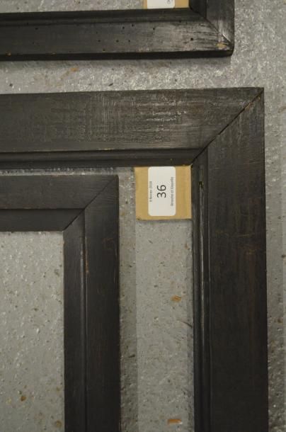 null QUATRE CADRES en bois mouluré et noirci. XIXe siècle.
32,5 x 46,3 cm - Profil:...