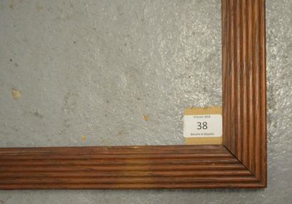 null CADRE en chêne mouluré à décor de stries. Circa 1900.
37,8 x 53,8 cm - Profil:...