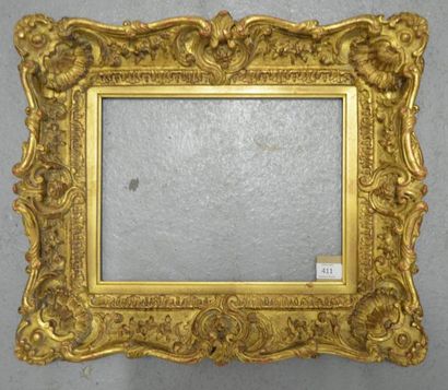 null CADRE en bois et stuc doré de style Louis XV. XXe siècle.
25,7 x 33,7 cm - Profil:...