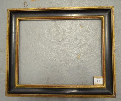 null GORGE en bois mouluré noir et or. Fin du XVIIIe siècle (petits éclats).
26 x...