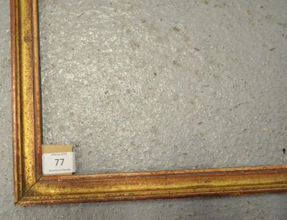 null BAGUETTE en bois mouluré et doré. Époque Louis XVI (usures).
29,7 x 40,8 cm...