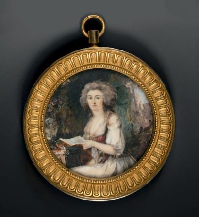 Jean-Baptiste HOIN (1750 - 1817) 
Portrait de femme assise à sa table tenant une...