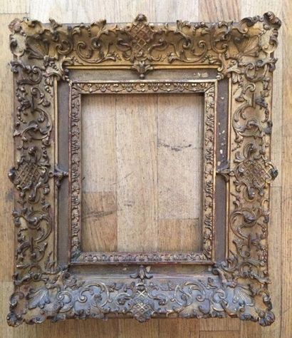 null Cadre en chêne et ornements en pâte dorée
Epoque Louis XIV
26 x 20 cm - Profil...