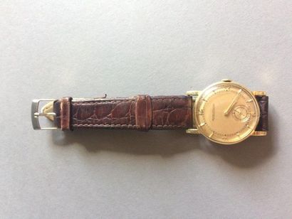 null Montre d'homme Jaeger Lecoultre en or jaune 18 K (750/°°) vers 1950. Bracelet...