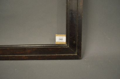 null CADRE en bois mouluré et noirci.
XIXe siècle. (piqures) 36,2 x 43,7 cm - Profil:...