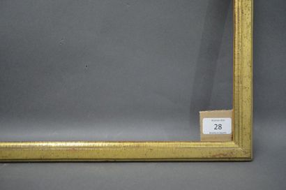 null BAGUETTE PLATE en bois mouluré et doré.
Époque Louis XVI (usures).
33,8 x 48,8...