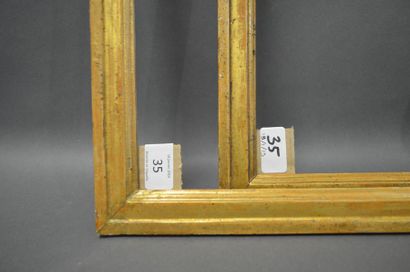 null PAIRE DE BAGUETTES en bois mouluré et doré.
Époque Louis XVI.
37,1 x 47,3 cm...