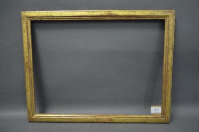null BAGUETTE plate en bois mouluré et doré.
Époque Louis XVI (usures).
33 x 45,5...