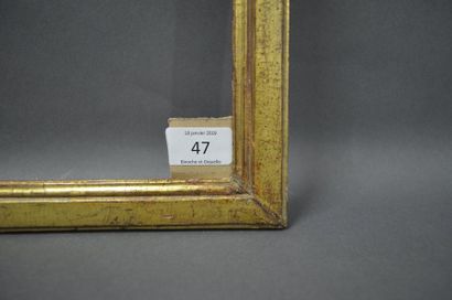 null BAGUETTE plate en bois mouluré et doré.
Époque Louis XVI (usures).
33 x 45,5...