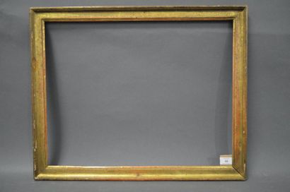 null BAGUETTE en bois mouluré et doré.
Époque Louis XVI (usures).
43,3 x 55,5 cm...