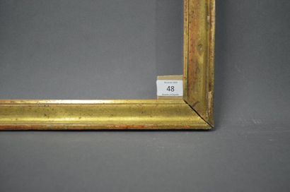 null BAGUETTE en bois mouluré et doré.
Époque Louis XVI (usures).
43,3 x 55,5 cm...