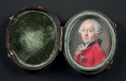 ECOLE DU XVIIIe SIÈCLE Portrait d'homme de qualité en habit rouge et perruque à rouleaux.
Miniature...