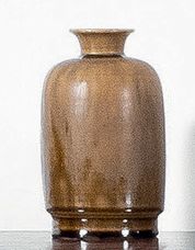 PAUL BONIFAS (1893-1967) 
Vase en céramique à corps tubulaire épaulé et col conique...