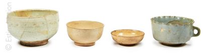 CHINE XIIème - XIIIème siècle Set of four white and celadon enamelled stoneware bowls...