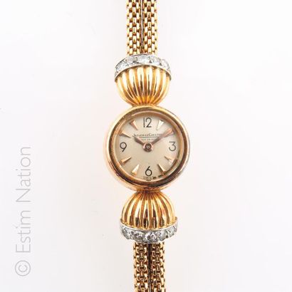 JAEGER LECOULTRE Ladies' watch in 18K yellow gold (750 thousandths) and platinum...