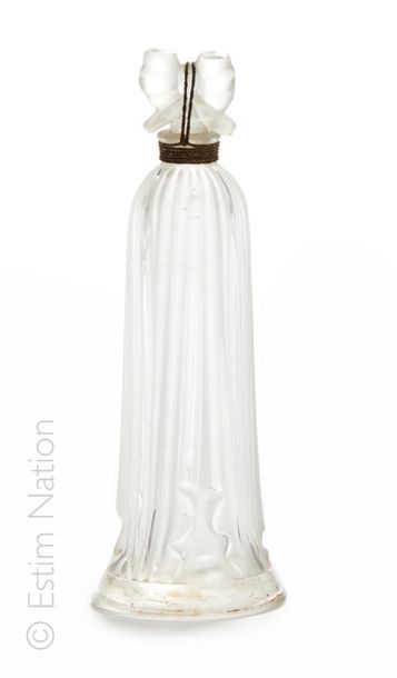 LUCIEN LELONG "Indiscret" Stylish glass bottle depicting a haute couture dress, cap...