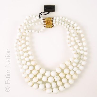 YVES SAINT LAURENT ATTRIBUE A NECKLACE NECKLACE with four rows of white tinted glass...