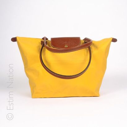 LONGCHAMP FOLDING BAG in yellow coated canvas and grained leather (31 x 50 x 15 cm)...