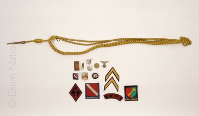 MILITARIA Lot de décorations et insignes divers dont : 
- insigne du 35è Régiment...
