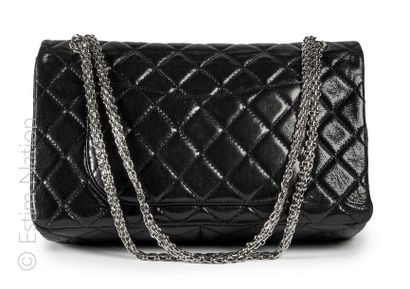 CHANEL (2008 - 2009) BAG 2.55 GM in black iridescent coated leather, double chrome...