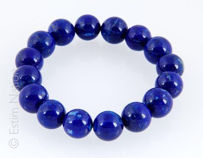 BRACELET LAPIS LAZULI Bracelet extensible composé de boules de lapis lazuli naturel....