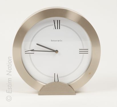 TIFFANY & CO TIFFANY & CO



Brushed steel table clock, the circular case resting...