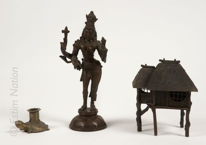 BRONZES 
Ardhanarishvara in chased bronze with brown patina, depicting Shiva in his...