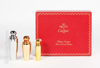 CARTIER « So Pretty » Box of three bottles: one 50mL Eau de Toilette spray bottle,...
