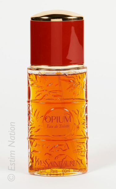 Yves Saint LAURENT Opium. Flacon atomiseur en verre contenant 100ml d'eau de toilette...
