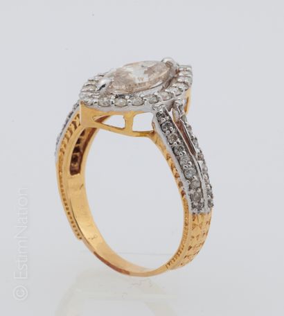 BAGUE DIAMANTS 
Marquise" ring in 14 K (585 thousandths) openworked yellow and white...